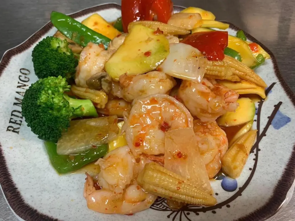 Spicy stir-fried shrimp with veggies like mango and broccoli at Red Mango Asian Cuisine Restaurant in Stratham