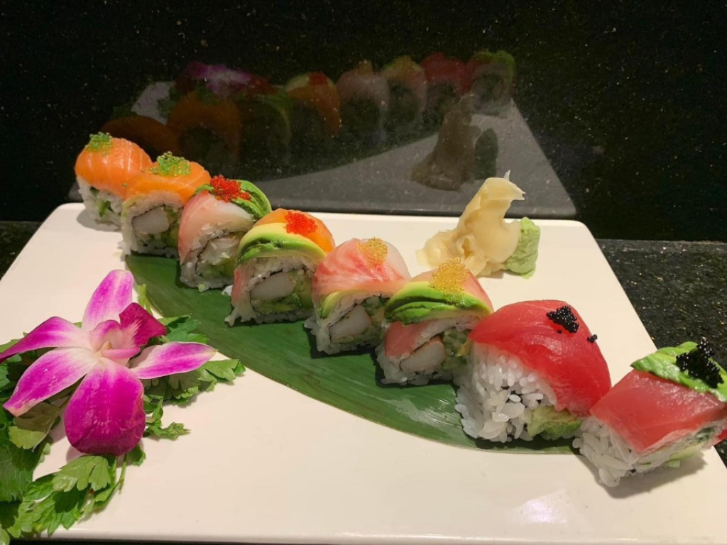 Platter of sushi rolls with salmon, tuna and toppings at Red Mango Asian Cuisine Restaurant in Stratham